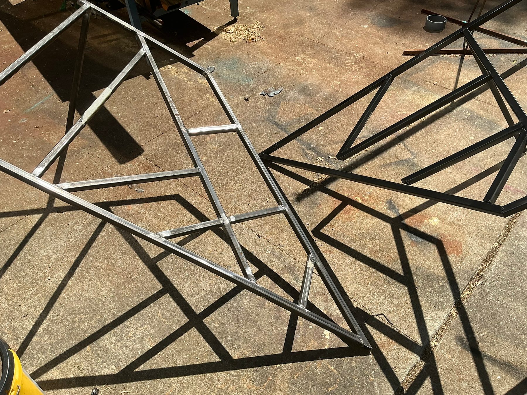 Bare steel beside the first coat of black